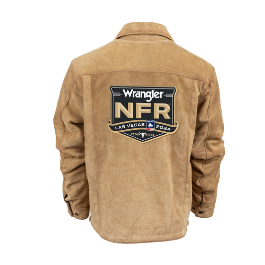 Tan jacket with a Wrangler NFR logo patch on the back.